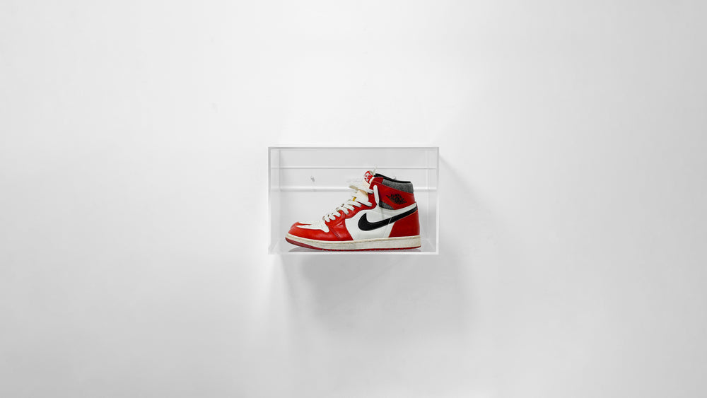 Flex-Mount floating sneaker display case wall-mounted with a red and white high-top sneaker